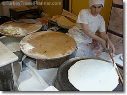 Rolling flat lavash bread, Hala Restaurant, Istanbul, Turkey