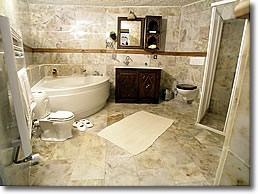 Cave bathroom with spa tub, Kelebek Hotel, Göreme, Cappadocia, Turkey