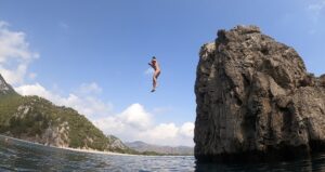 Cliff jumping in Olimpos Turkey